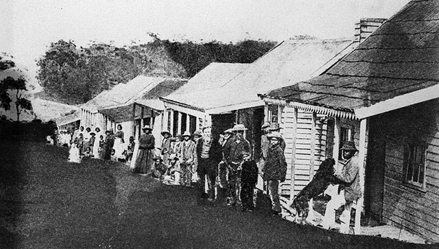 Lake Tyers - people in front of houses, 1880